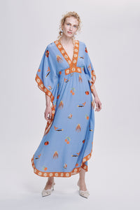 Carolina K Taiel kaftan in vibrant, flowing fabric, featuring intricate patterns and a relaxed, elegant fit.