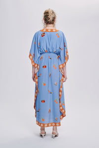 Carolina K Taiel kaftan in vibrant fabric, flowing and elegant, styled as a casual yet chic clothing piece.
