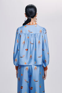 Carolina K Elisa shirt, stylish and lightweight clothing with a unique pattern, shown on a model.