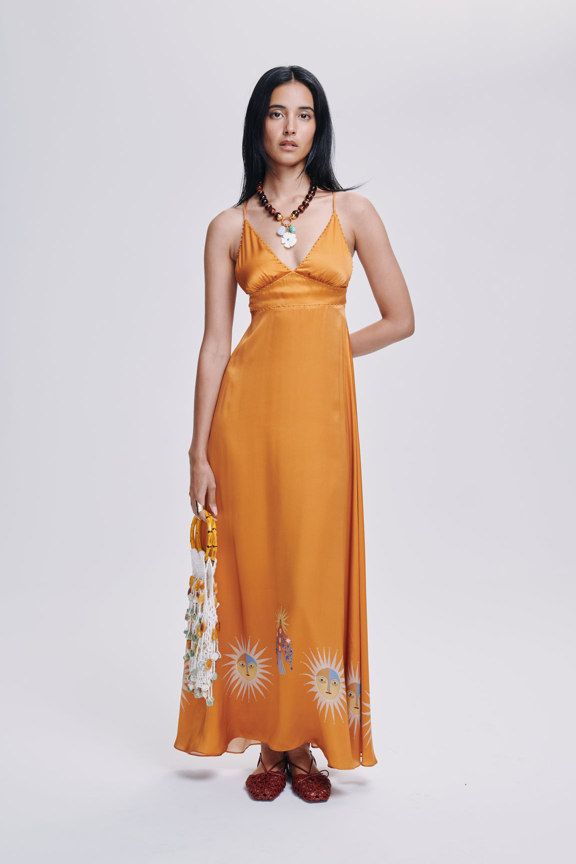 Carolina K star dress, stylish women's clothing with a star pattern, showcased in a full-length view.