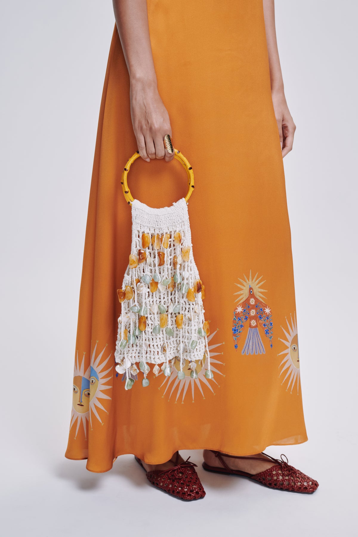 Carolina K star dress in stylish clothing, featuring a vibrant star pattern and flowing design, perfect for casual or dressy occasions.
