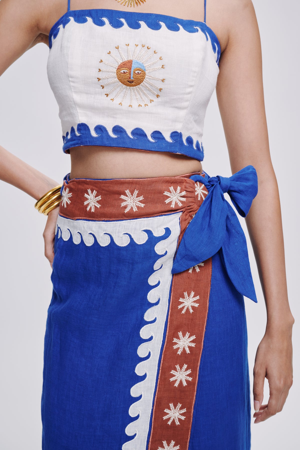 Carolina K Maggie top, stylish women's clothing in a vibrant, patterned fabric, displayed on a model.