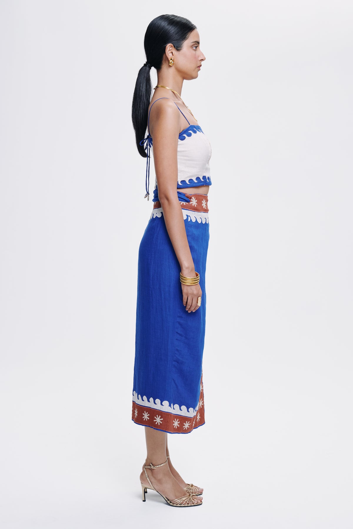 Carolina K Maggie top, stylish clothing item with intricate design, shown in a close-up image highlighting fabric and details.