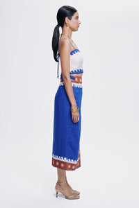 Carolina K Loren skirt in vibrant patterned fabric, shown on a model, showcasing stylish and colorful clothing design.