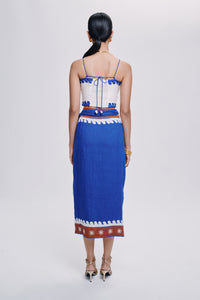 Carolina K Maggie top, stylish women's clothing in a vibrant design, displayed on a model with a focus on the top's fabric and fit.