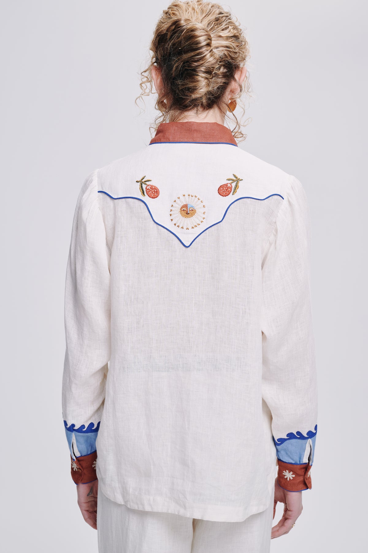 Carolina K rodeo shirt in vibrant western-inspired design, featuring detailed embroidery and stylish button-up front.
