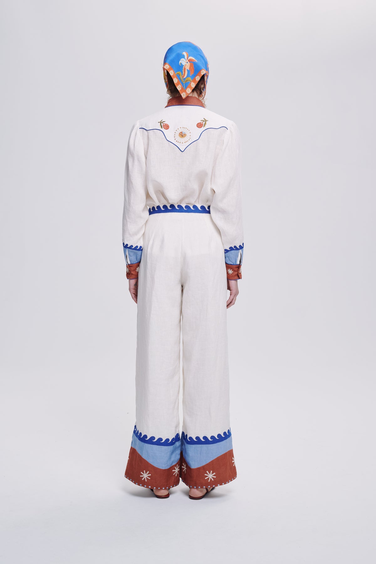 Carolina K Palazzo Pant in lightweight fabric with flowing wide-leg design and subtle pattern details.