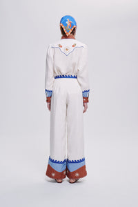 Carolina K Palazzo Pant in lightweight fabric with flowing wide-leg design and subtle pattern details.