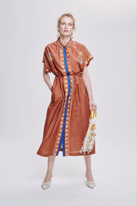 Carolina K Valerie kaftan in vibrant, flowing fabric with intricate patterns, perfect for stylish, comfortable summer wear