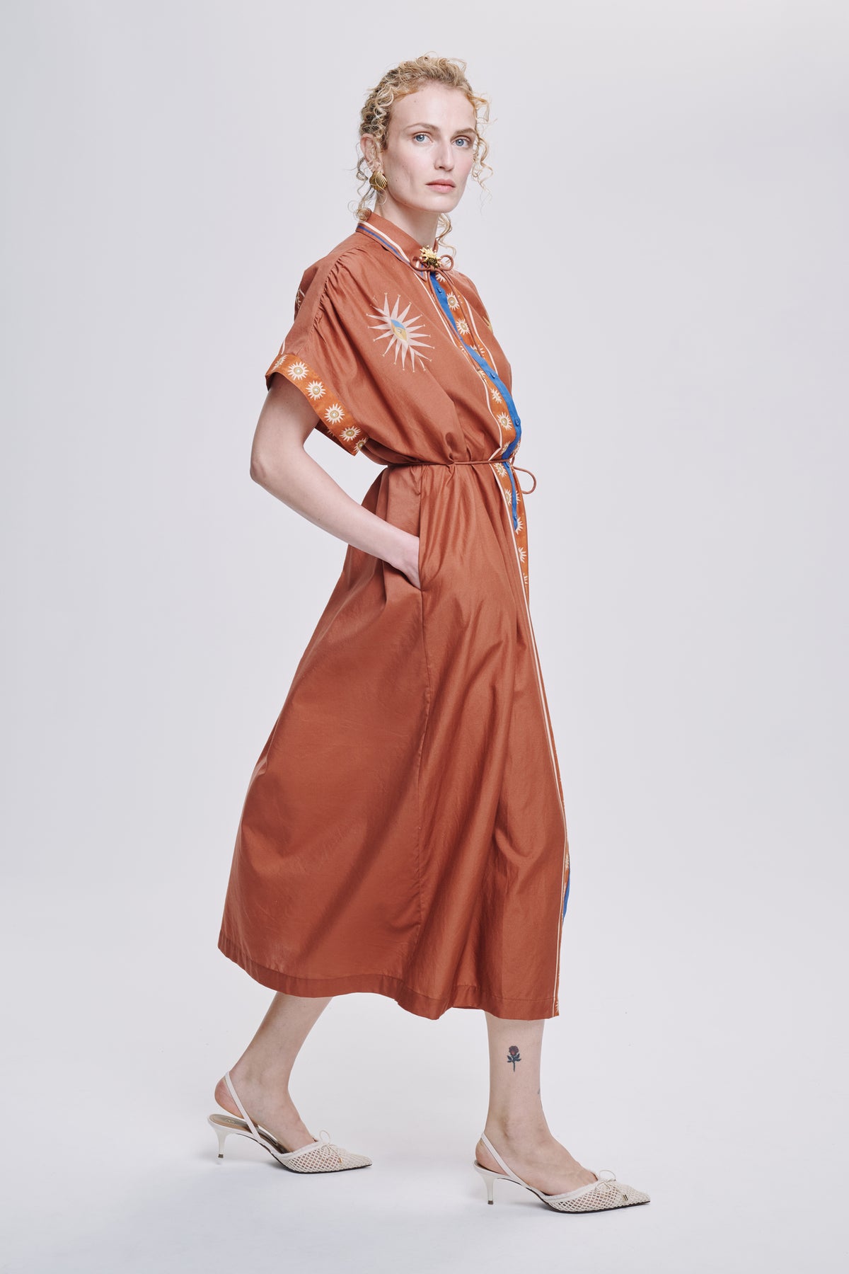 Carolina K Valerie kaftan in vibrant patterned fabric, flowing and lightweight, designed for stylish, comfortable wear.