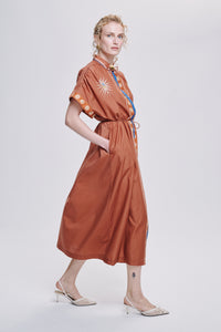 Carolina K Valerie kaftan in vibrant patterned fabric, flowing and lightweight, designed for stylish, comfortable wear.
