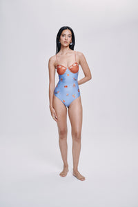 Carolina K Victoria One Piece clothing in vibrant fabric, featuring a stylish, fitted design with elegant detailing.