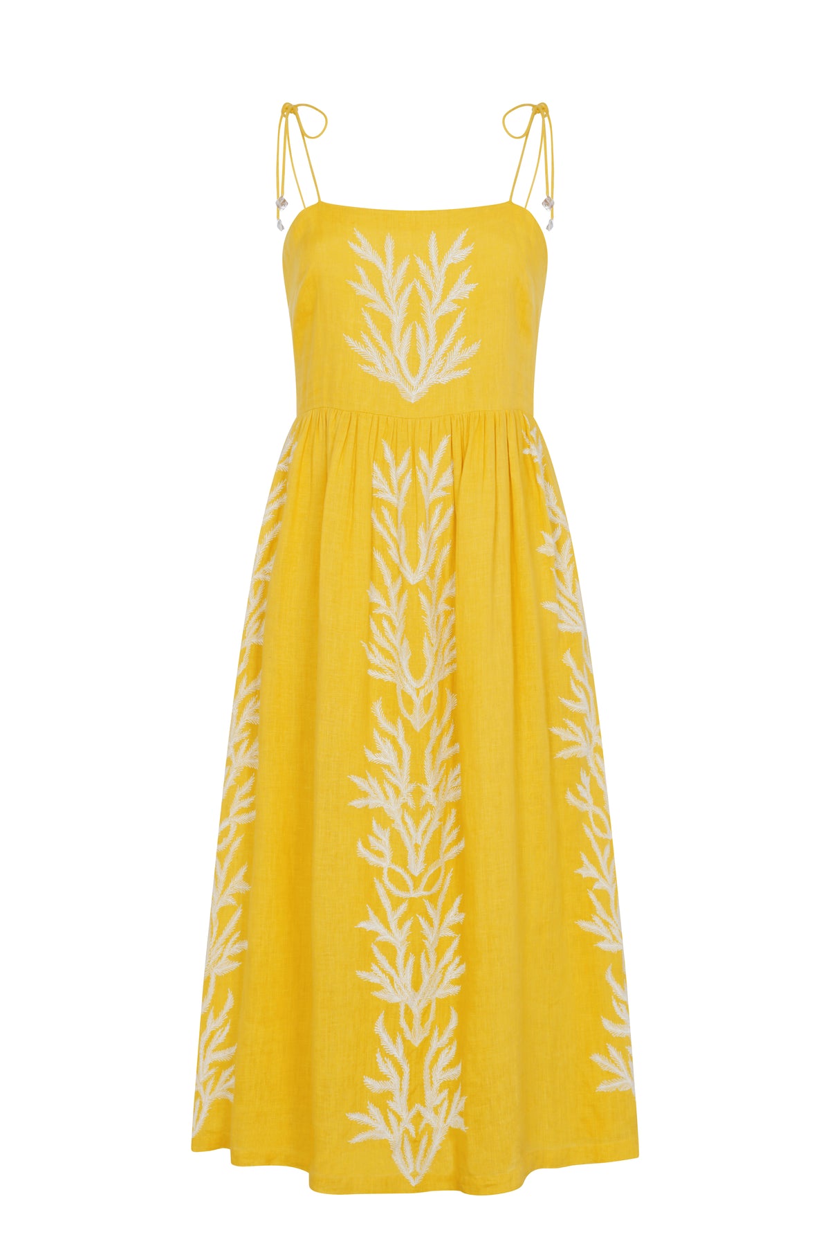Yellow linen midi dress with a square neckline, adjustable shoulder ties, and white embroidered botanical details throughout. Finished with a relaxed, feminine silhouette.