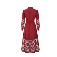 Back view of Carolina K Anais Dress featuring flowing fabric and intricate design details.