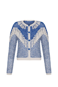 Hand-crocheted blue and ivory cardigan with a button-front closure, long sleeves, and decorative fringe detailing. Designed with an airy open-knit texture and contrast trim for a handcrafted look.