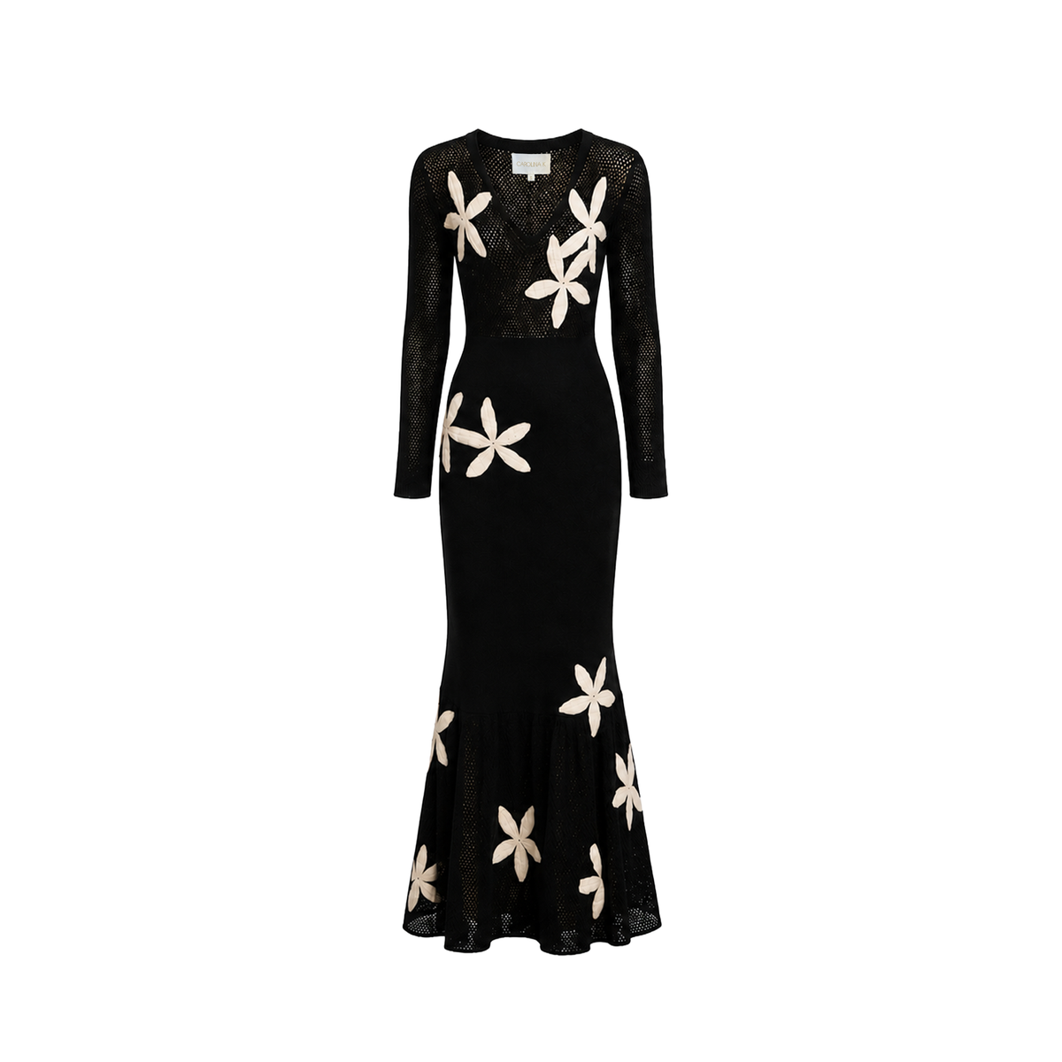 Carolina K Betania Dress featuring vibrant floral patterns and a flowing silhouette, perfect for casual or summer wear.