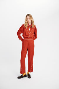 Carolina K rodeo shirt featuring stylish Western-inspired design with intricate patterns and button-down front.