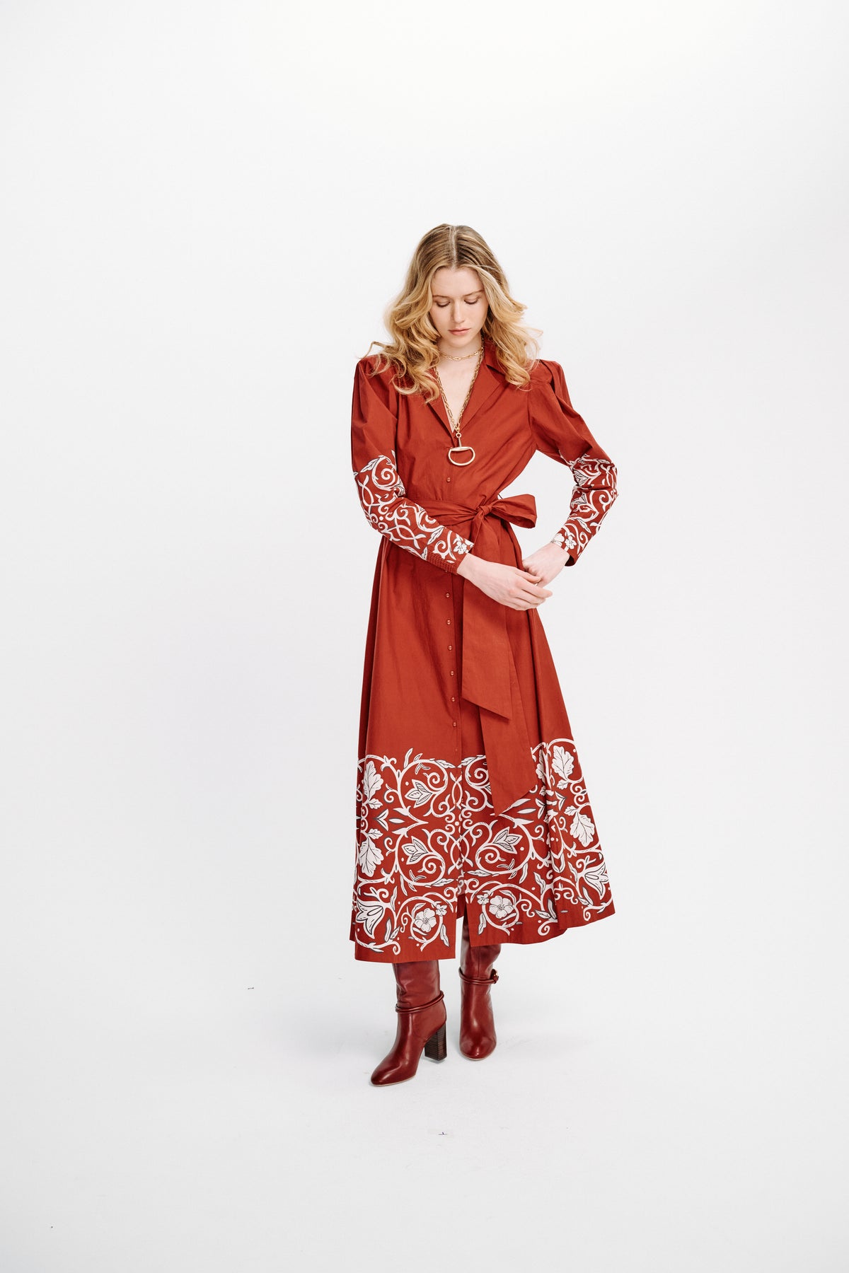 Carolina K Anais Dress featuring a flowing design with intricate patterns, stylishly displayed on a model.