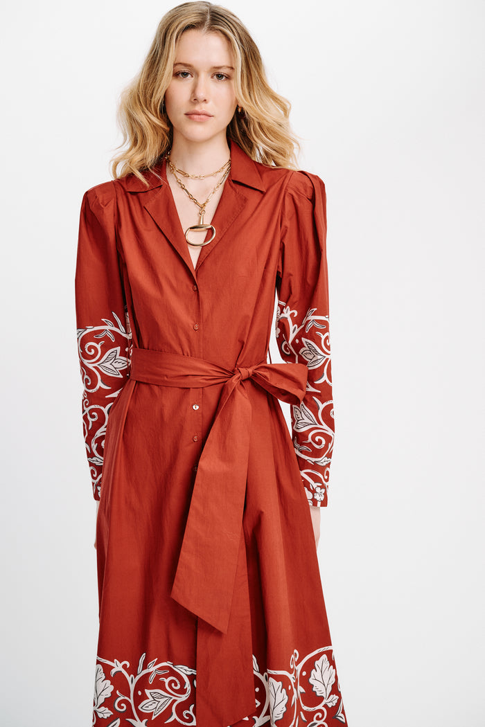Carolina K Anais dress featuring floral pattern and flowing fabric, shown in a full-length view on a model.