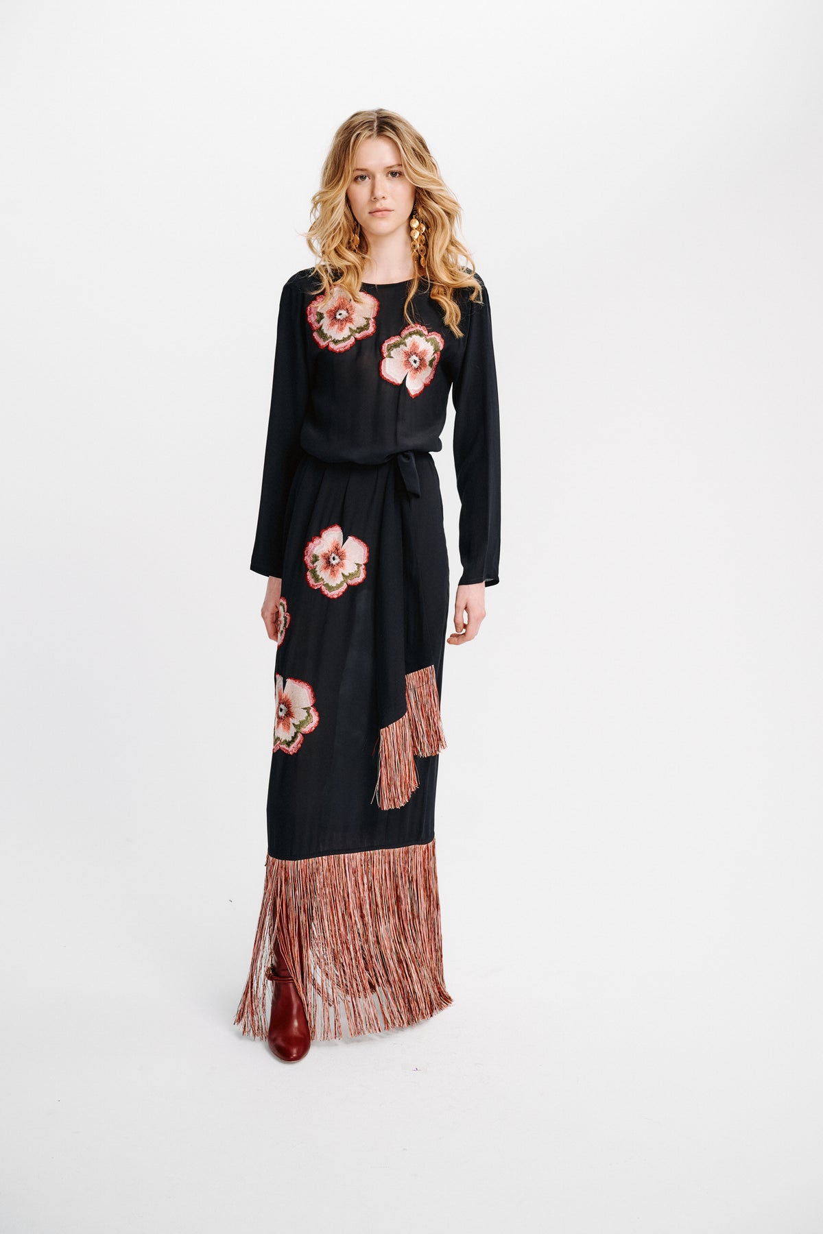 Carolina K Tamzeen dress in vibrant patterned fabric, featuring a flowing silhouette and stylish design.