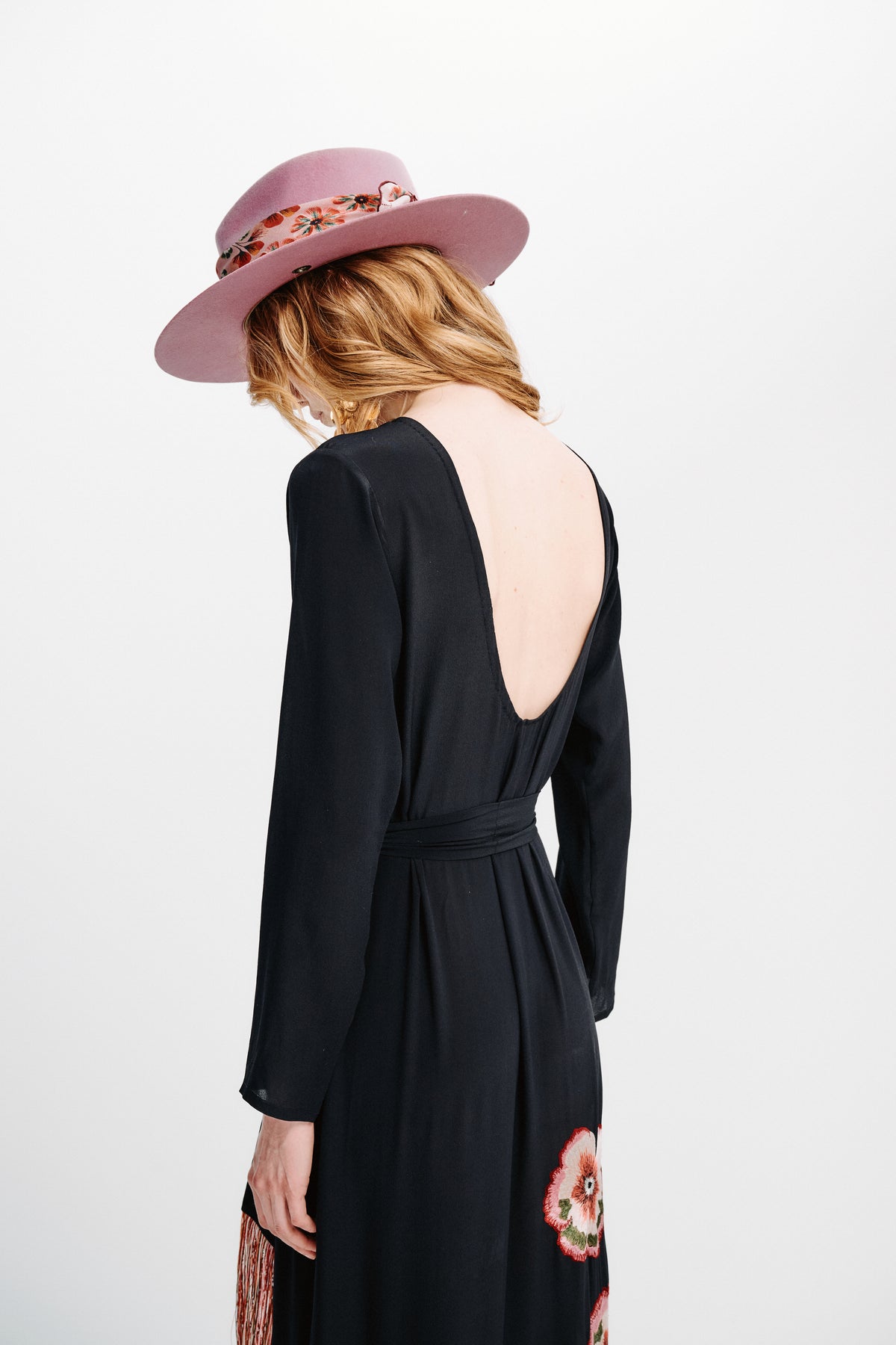 Carolina K Tamzeen dress in vibrant fabric, featuring a flowing silhouette and stylish design, displayed on a model.