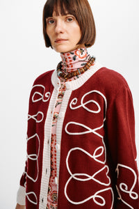 Elsa cardigan by Carolina K, soft knit with a relaxed fit, featuring a light color and cozy design perfect for layering.