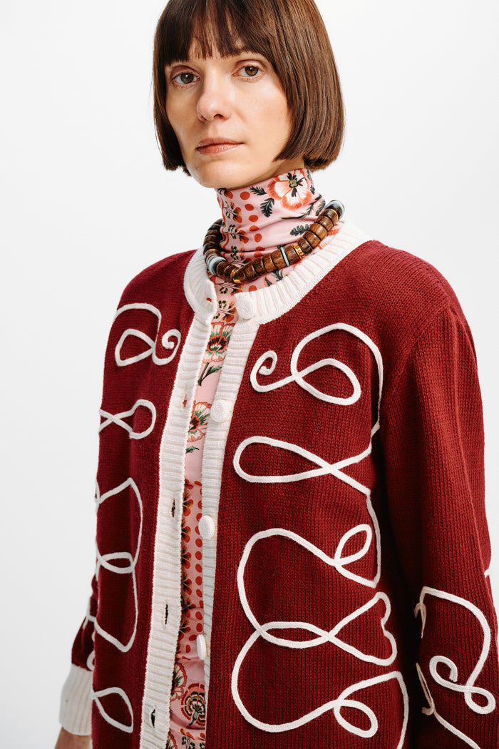 Elsa cardigan by Carolina K, soft knit with a relaxed fit, featuring a light color and cozy design perfect for layering.