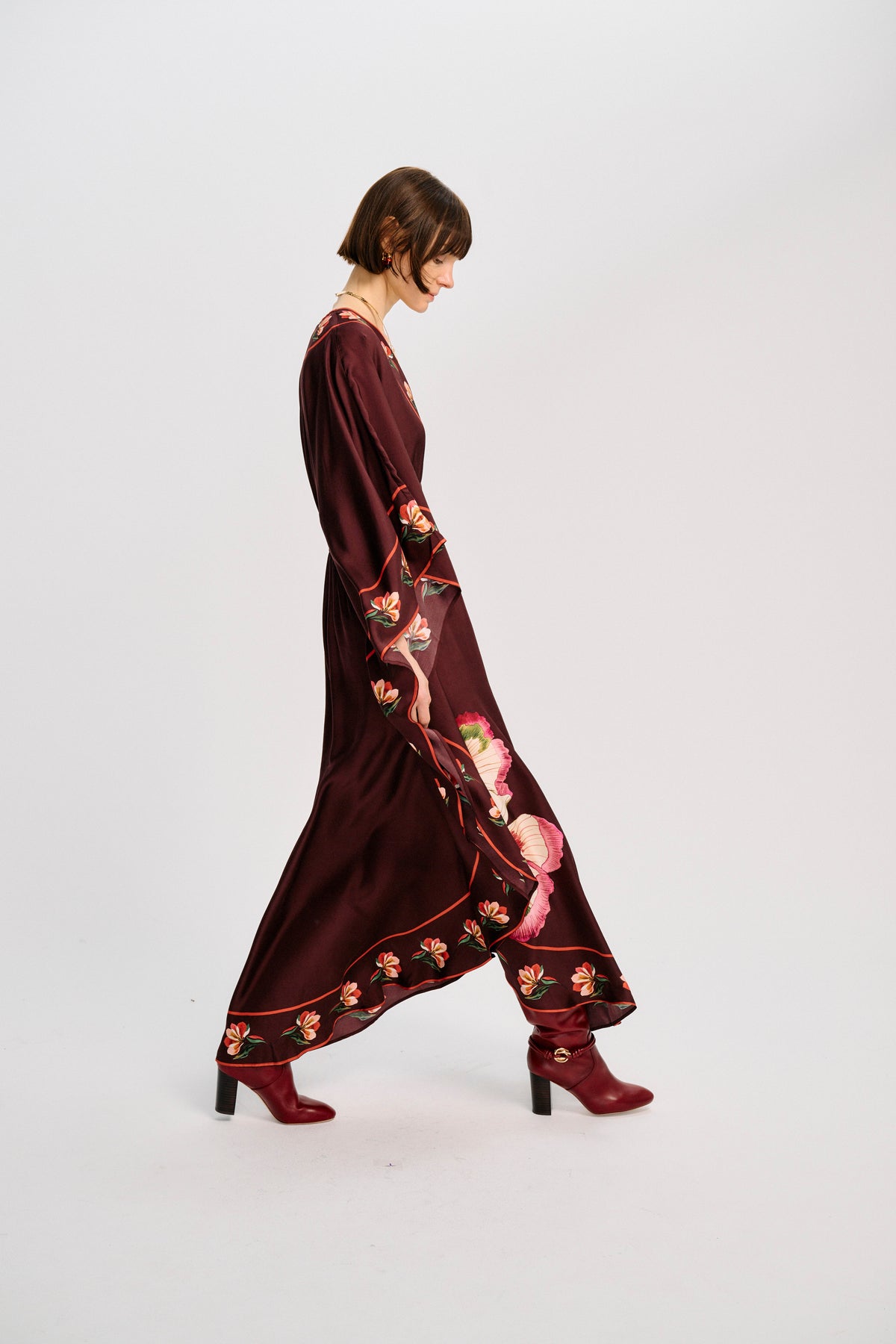 Carolina K Taiel kaftan in vibrant fabric, flowing design, and intricate pattern, perfect for elegant summer wear.