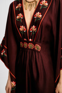 Carolina K Taiel Kaftan in vibrant fabric, flowing design, and detailed embroidery, perfect for elegant summer wear.