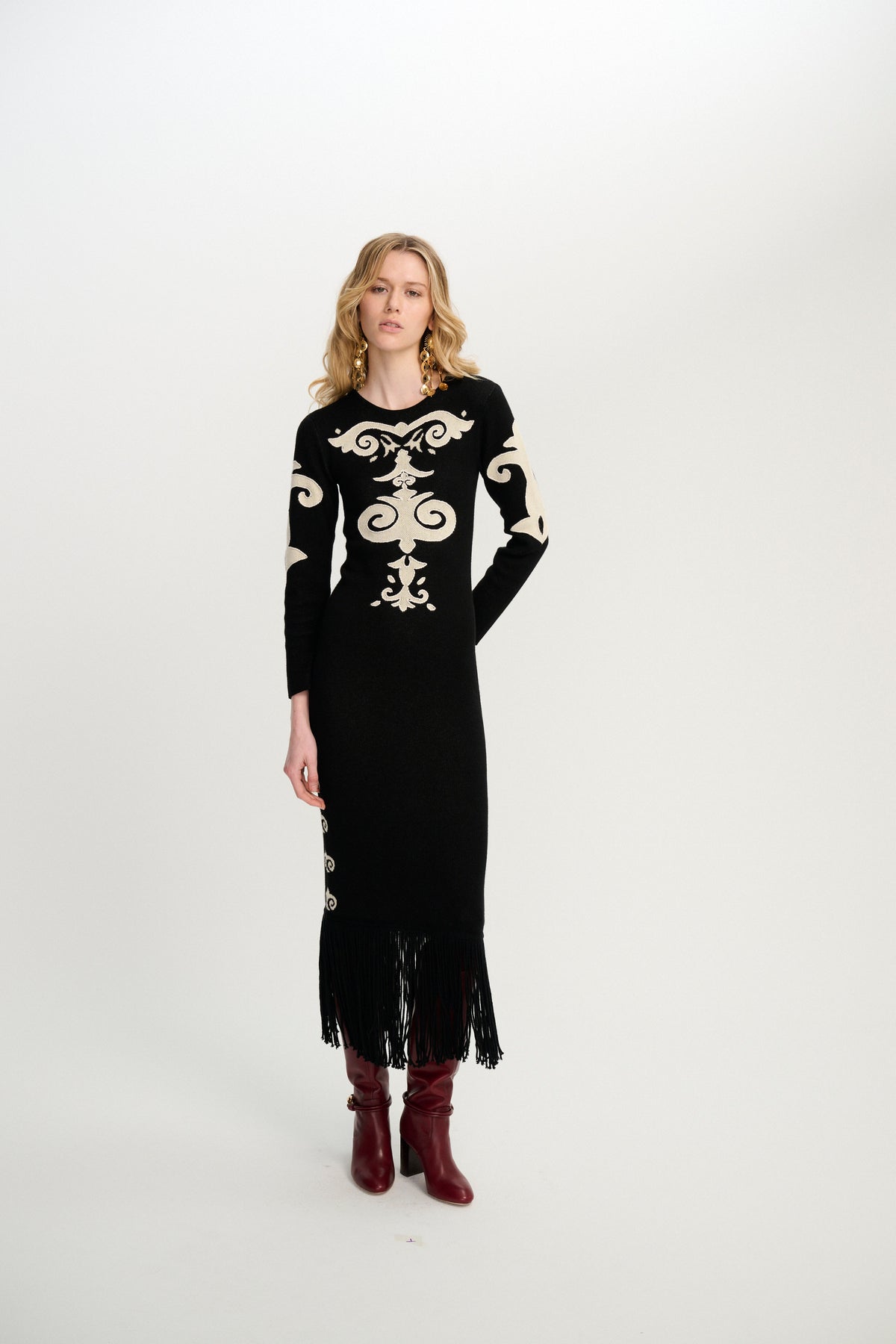 Carolina K Elizabeth Dress featuring a stylish, flowing design with intricate patterns and elegant fabric.