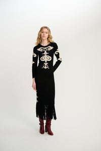 Carolina K Elizabeth Dress featuring a stylish, flowing design with intricate patterns and elegant fabric.