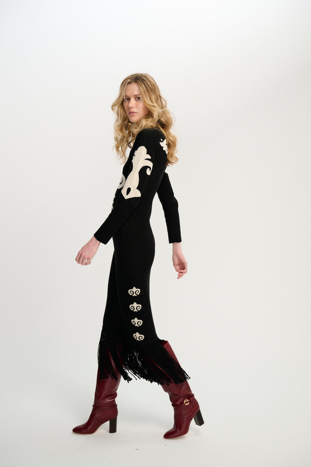 Carolina K Elizabeth dress in vibrant floral print, showcasing its elegant design and flowing fabric.