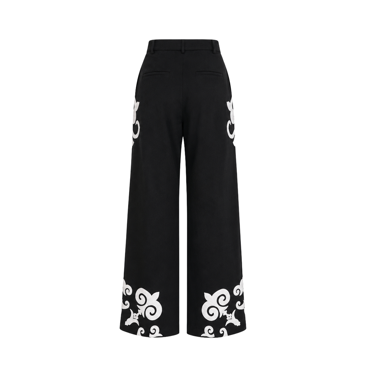 Back view of Carolina K Caleb Pant in neutral fabric, showcasing tailored fit and waistband details.