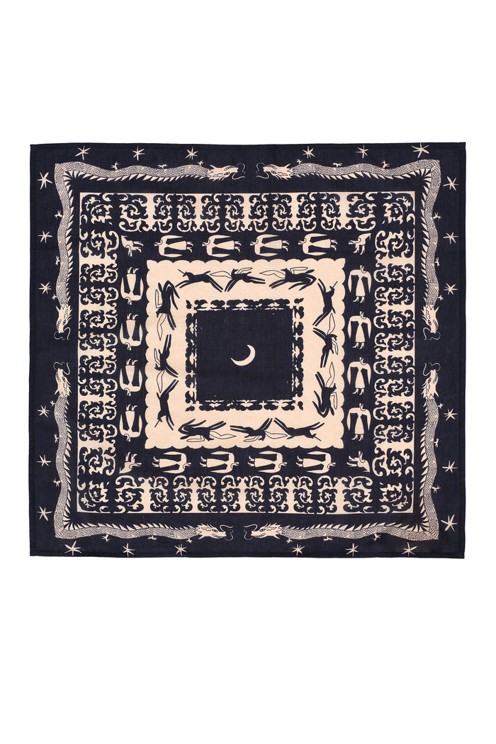 Square bandana in black and cream with an intricate folkloric design. The central motif features a crescent moon surrounded by symmetrical borders of galloping horses, mythical figures, stars, and dragons. The pattern builds outward in layers of storytelling-inspired symbols, creating a bold and graphic visual statement.