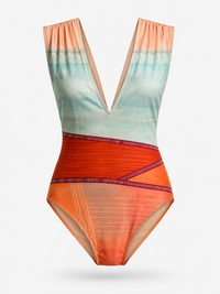Carolina K Liset One Piece clothing in vibrant colors, featuring a stylish, fitted design with off-shoulder details and bold pattern.