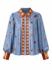 Carolina K Elisa shirt, stylish women's clothing with a relaxed fit, featuring a floral pattern and lightweight fabric.