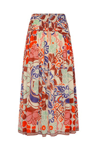 The back is finished with a comfortable smocked waistband that offers flexibility and ease. The flowing skirt highlights the vibrant print from every angle.
