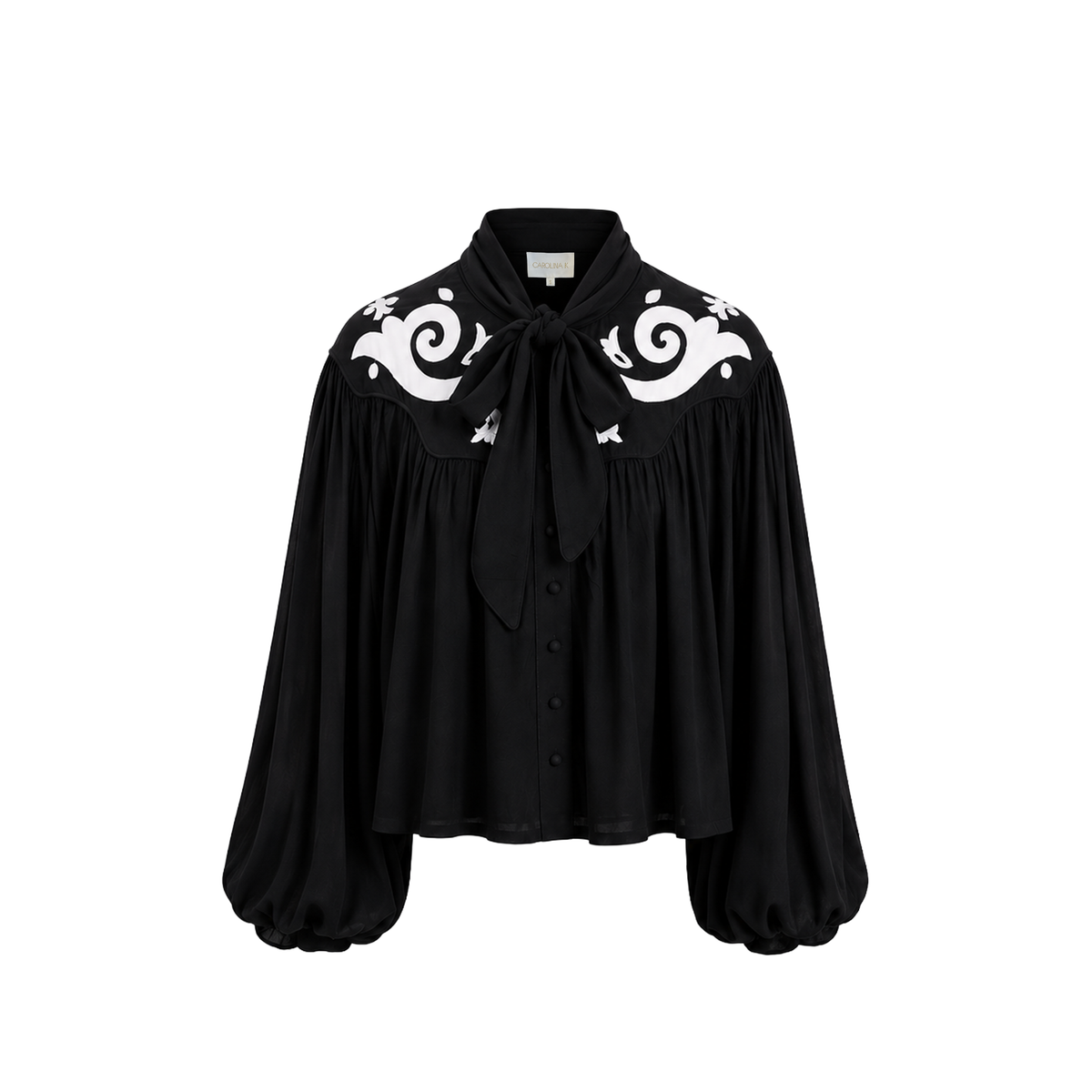 Carolina K Jena Top long-sleeve shirt with a simple design, shown from the front in the product image.