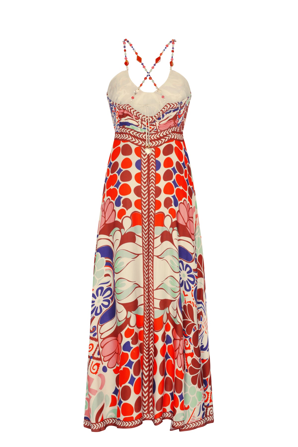 The back showcases crisscross beaded straps and a smocked panel for a comfortable, flexible fit. The flowing skirt drapes beautifully, adding movement and ease to this statement summer dress.