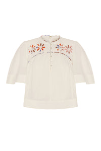 Lightweight off-white blouse featuring colorful floral cutout embroidery across the yoke and delicate contrast piping detail. Designed with a band collar, partial button placket, softly gathered silhouette, and relaxed elbow-length sleeves.