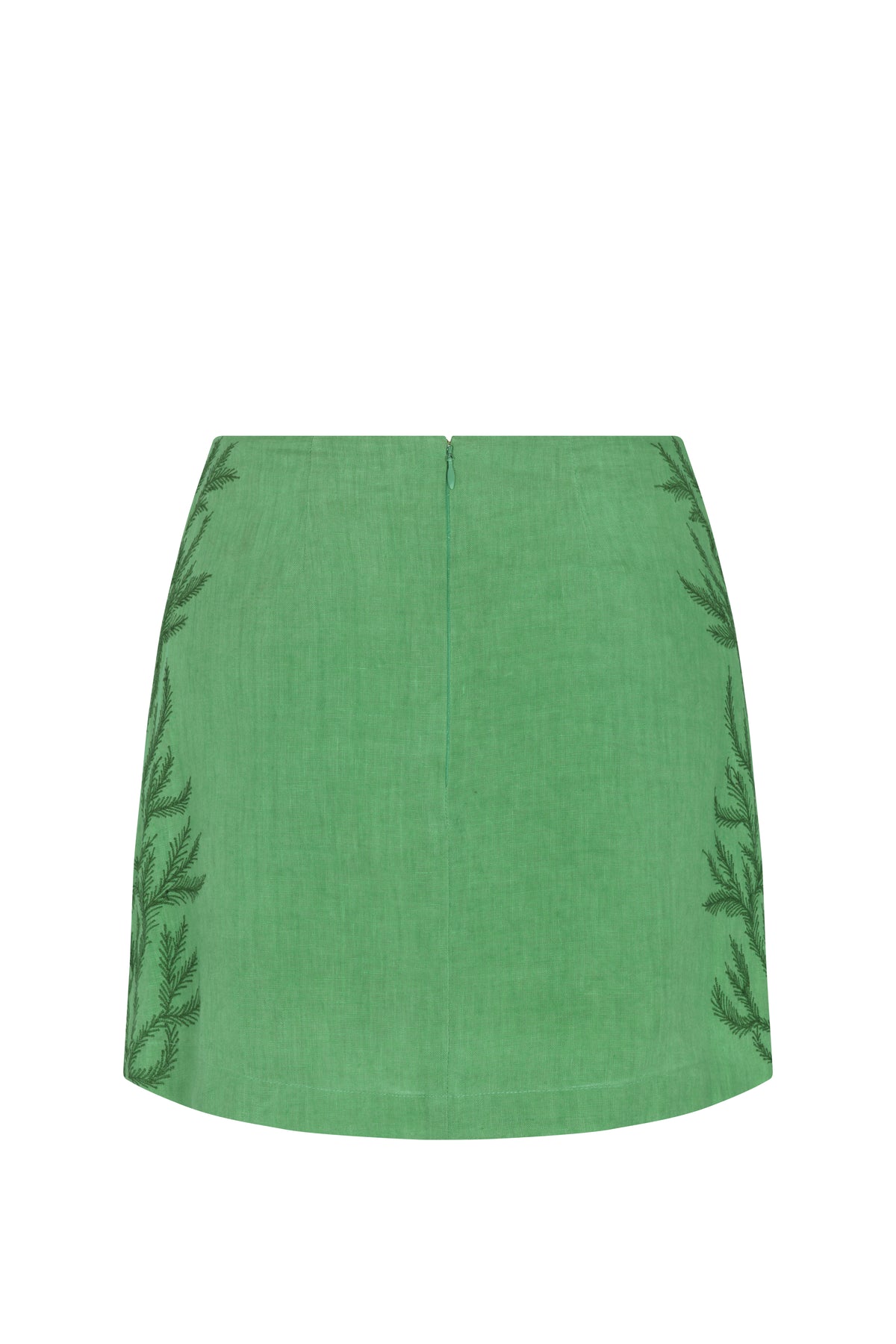 Mint-green mini skirt with a streamlined silhouette, concealed back zip closure, and delicate botanical embroidery framing the side panels. A refined wardrobe staple with understated artisanal detailing.