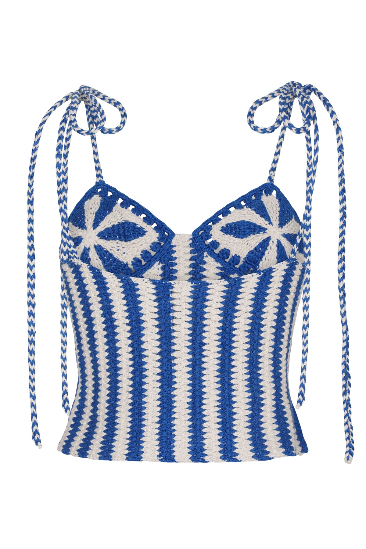 Crochet camisole top crafted in alternating blue and ivory stripes, with floral crochet cups and long braided shoulder ties that knot at the shoulders. The fitted silhouette highlights the artisanal texture and intricate handwoven construction.