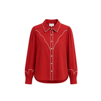 Red Carolina K Rodeo Shirt with Western design and button-front, ideal for casual or rodeo-inspired style.
