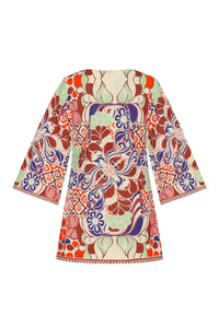 Relaxed-fit dress featuring an allover Punta-inspired print with ornate floral, scroll, and geometric motifs in shades of rust, coral, blue, mint green, and cream. The design includes wide three-quarter sleeves, a straight silhouette, and a concealed back zipper closure.