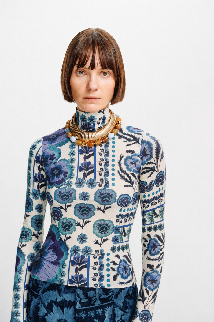 Carolina K Viento Turtleneck in soft fabric, front view showing fitted style and classic neckline on a neutral background.
